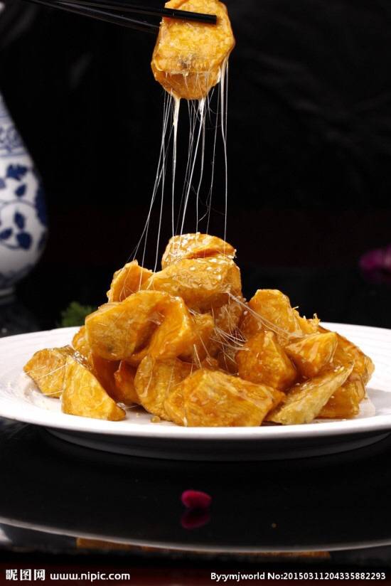 쭉쭉 늘어나는 엿가락이 특징인 중국 고구마 맛탕.jpg | 인스티즈